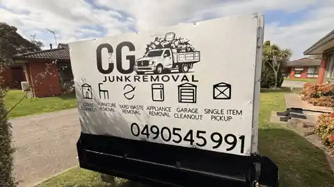 CG Junk Removal trailer ready for a property clean-up